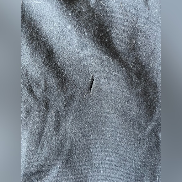 Black Lululemon leggings with criss-cross on the back of the legs - Picture 2 of 3